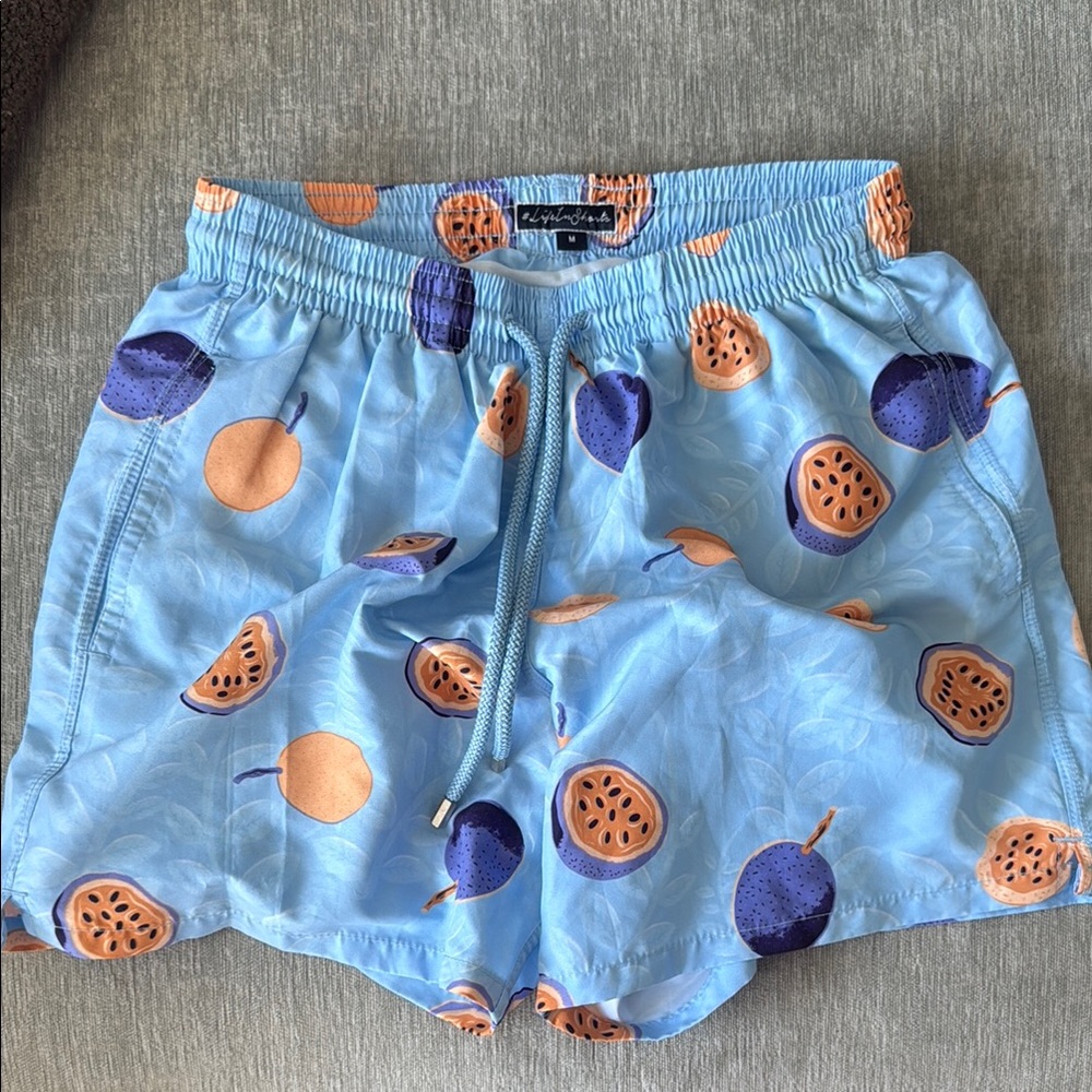 Light Blue Vilebrequin Swim Trunks with Orange and Purple Print